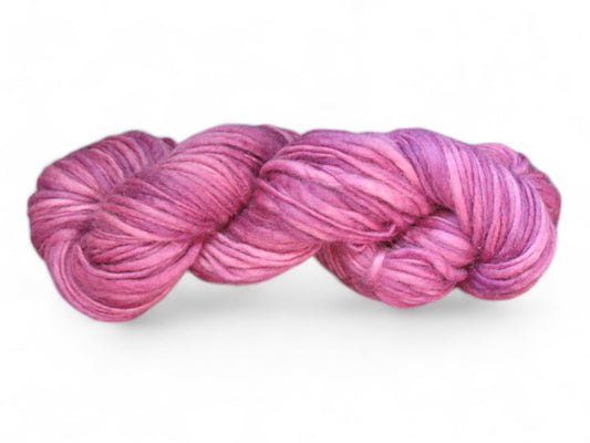 Vibrant fuchsia red merino wool yarn, handspun and hand-dyed, worsted weight, one ply, 3.5 oz skein.