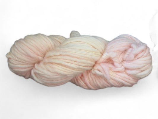 Delicate pale pink pastel merino wool yarn, hand-dyed and handspun, worsted weight, one ply, for soft and elegant creations